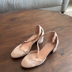 Nude closed toed heels